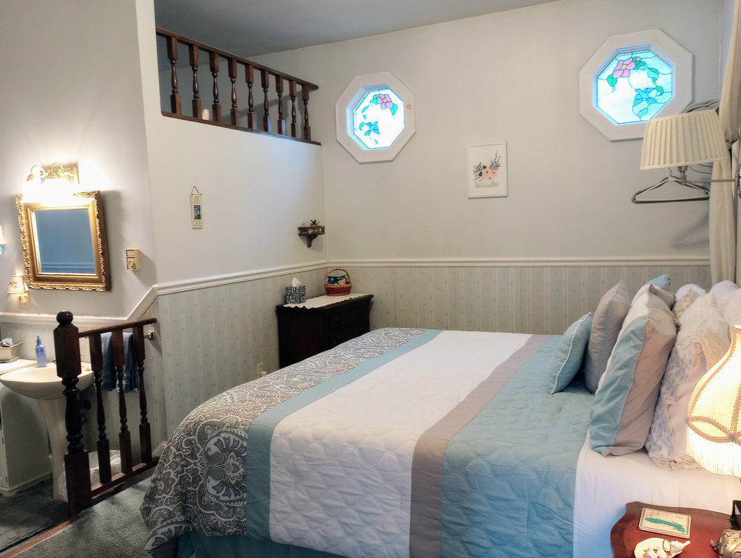 Romantic Retreat Suite features a huge new comfortable king sized bed.