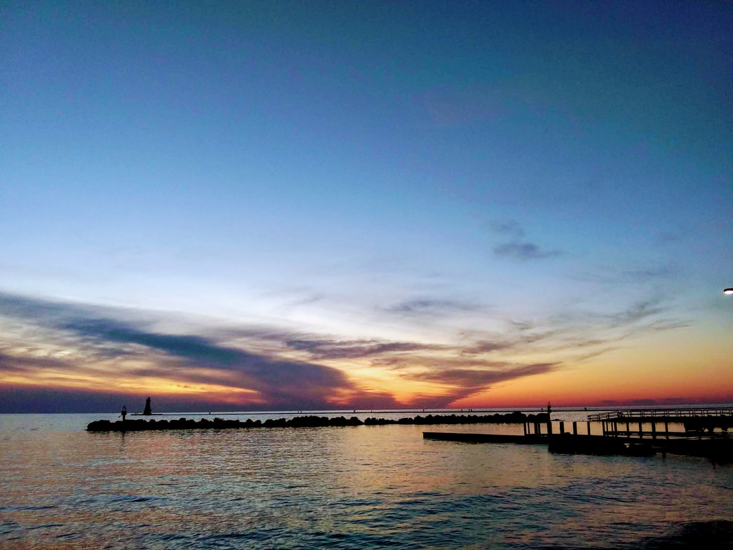The nearby pier is so peaceful and beautiful during another splendid sunset.