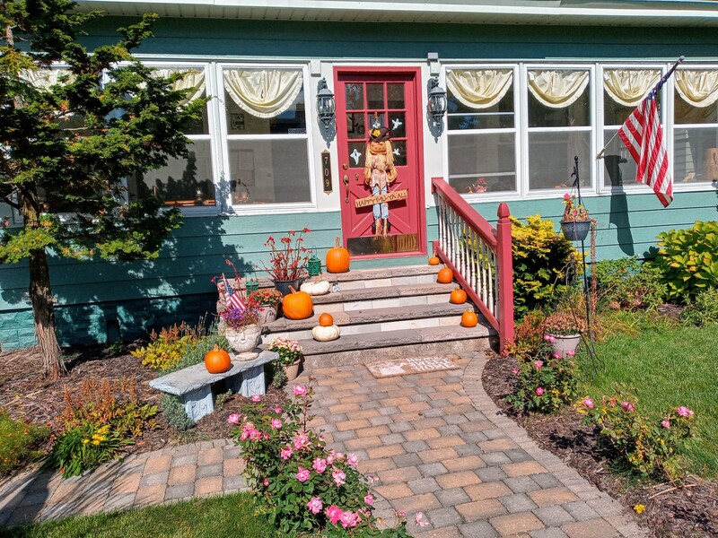 It's fall here and the front and back of the Candlelite Inn are adorned with pumpkins and scarecrows.