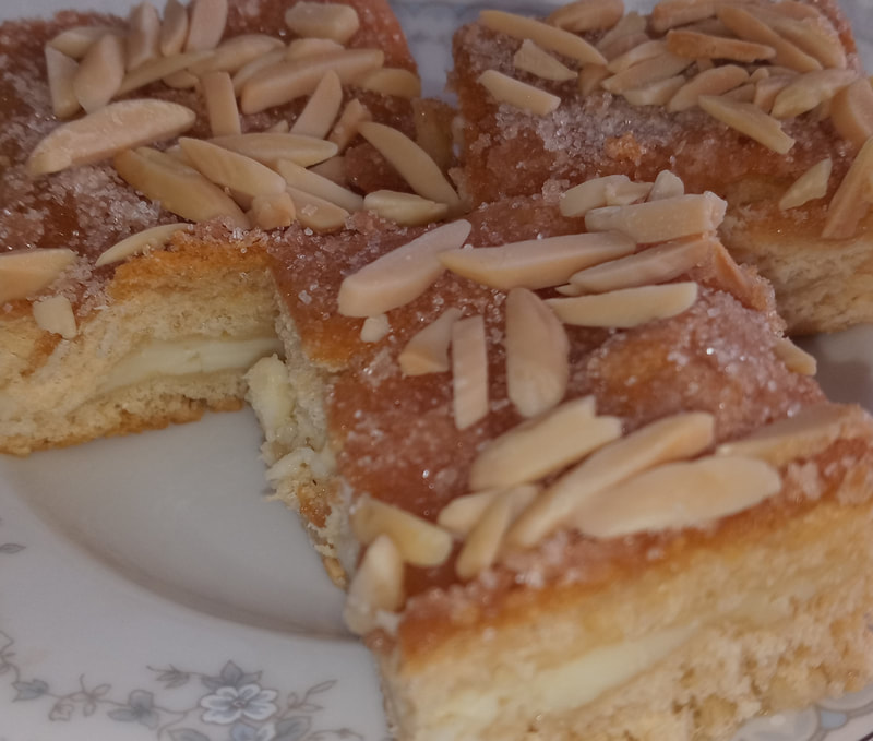 Cinnamon cream coffee cake is often requested before guests even pop in the doors.