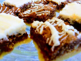 Candlelite Inn cookie bars with white chocolate drizzle.