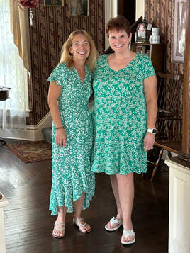 It's green dress day! Melanie & Di are matching today.