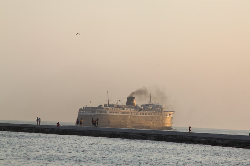 Historic SS Badger, the last sailing Lake Michigan car ferry, is always a sight to see come in and out of port.
