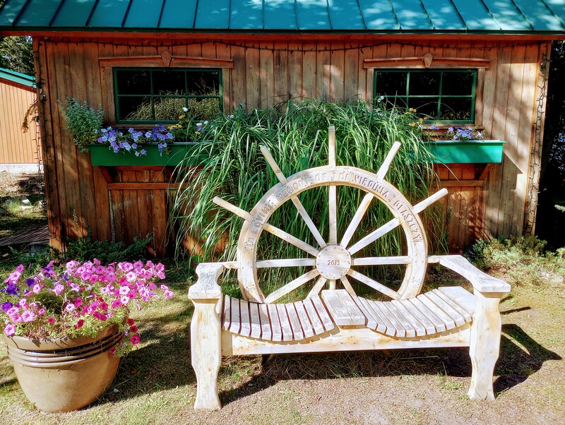 Relax and sit a spell at the De Tour Village Botanical Garden.