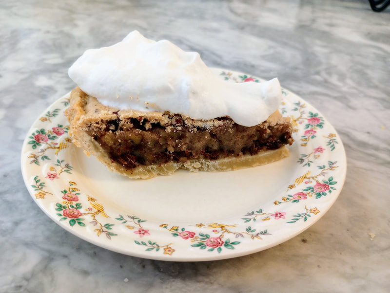 Candlelite Inn B&Bs Derby pie topped with freshly whipped cream is a sweet southern delight.  