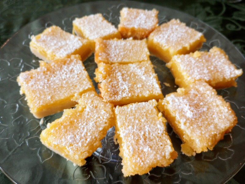 Tart lemon bars sprinkled with confectioner's sugar are always a welcome treat at Candlelite Inn Bed & Breakfast