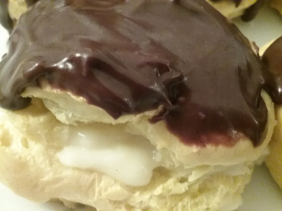 They are a yummy labor of love, freshly baked chocolate eclairs filled with a delicious creamy center.